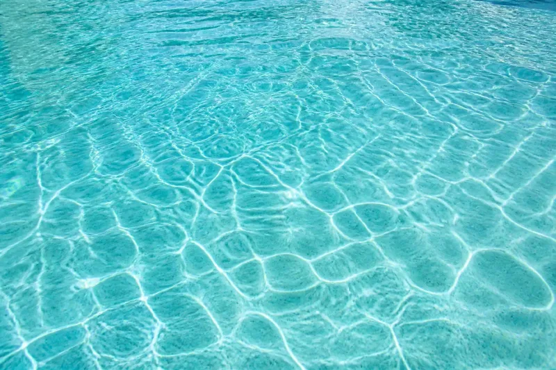 Balanced, clear pool water on a Dallas, Texas weekly service route